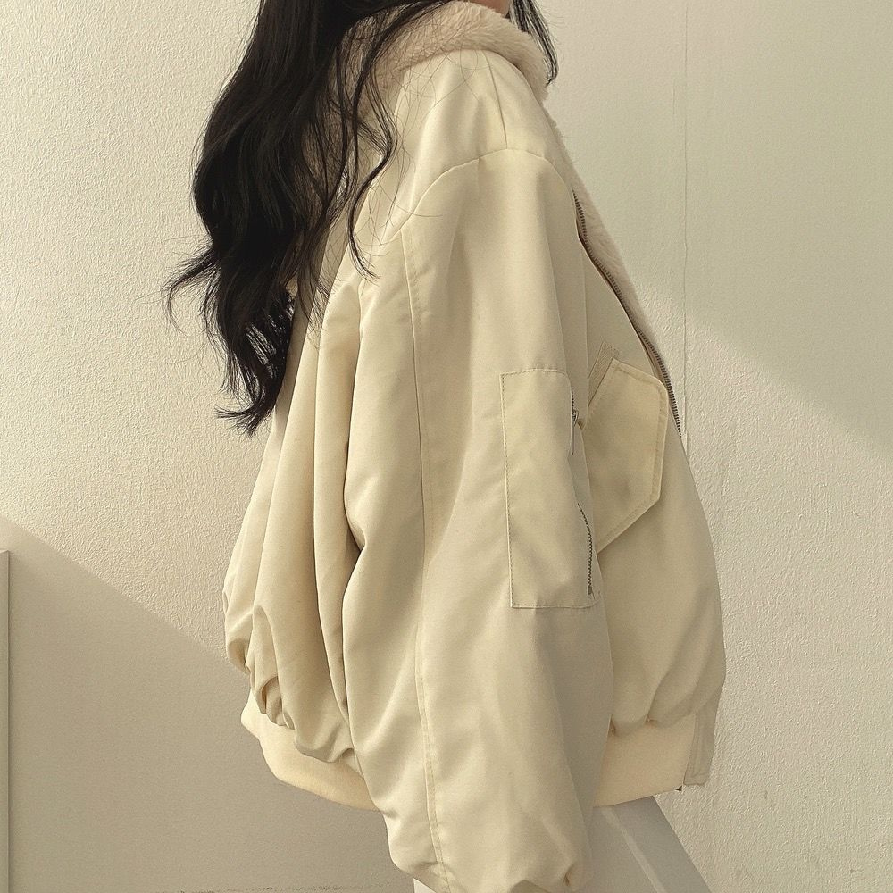 Essential women's reversible winter jacket with hood, Isla, offering warm and versatile outerwear solutions.