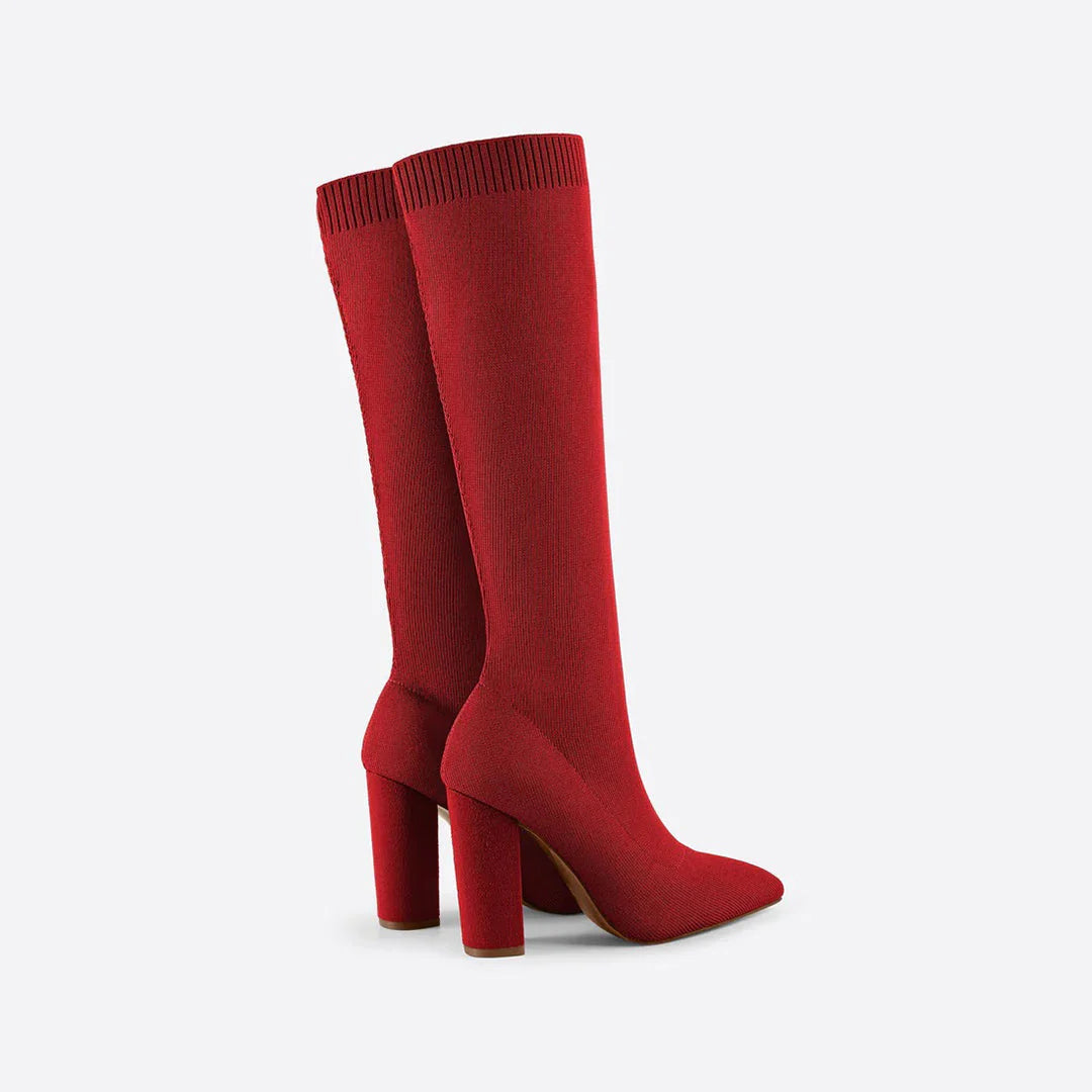 Fashionable women's boots: knee-high stretch design with a comfortable modern block heel. Perfect tall footwear.