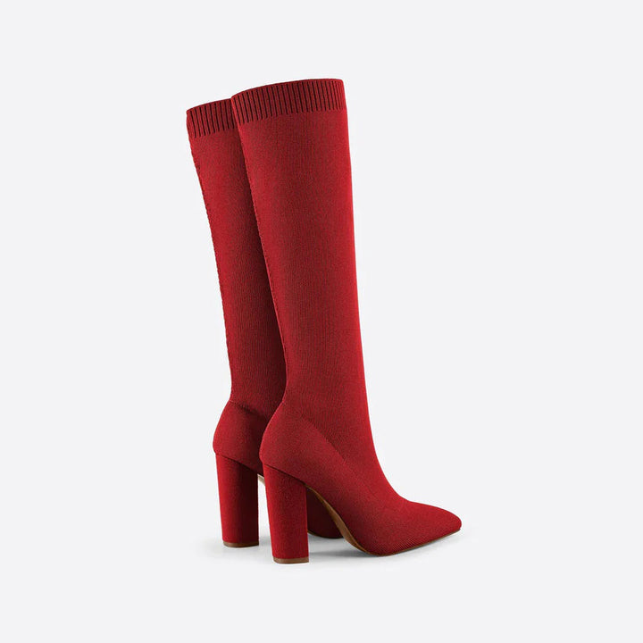 Fashionable women's boots: knee-high stretch design with a comfortable modern block heel. Perfect tall footwear.