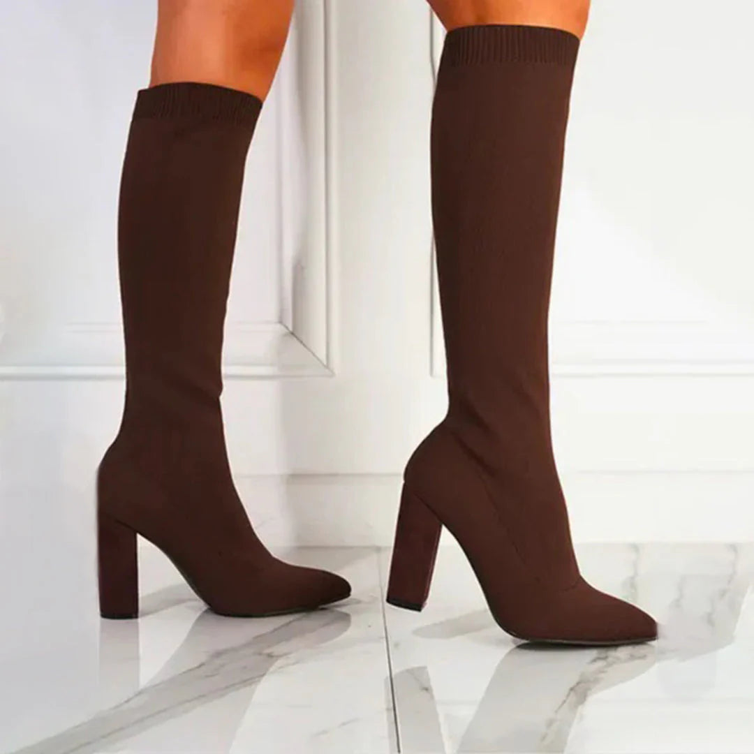 Versatile women's knee-high fashion boots. Elegant stretch design with a sturdy modern block heel.