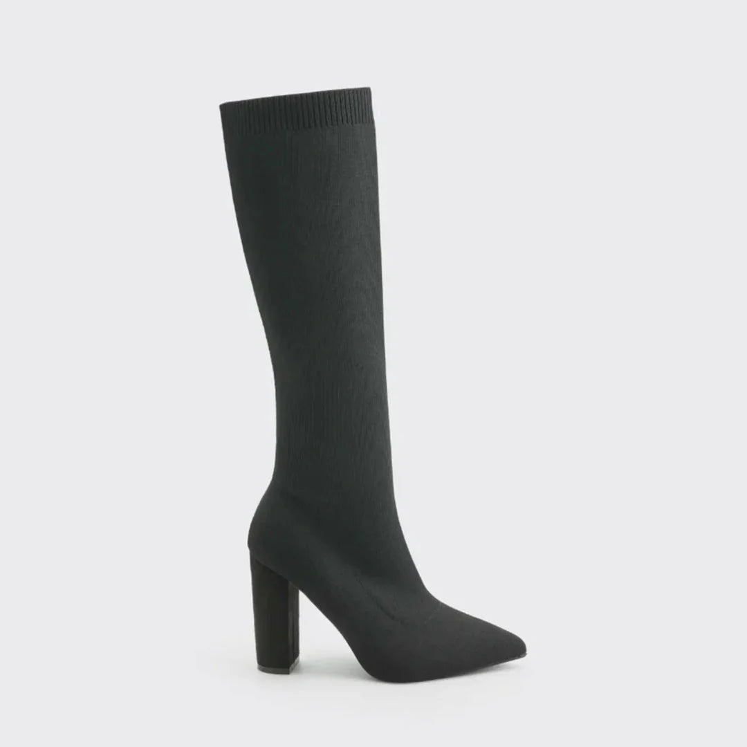 Slip-on women's stretch knee-high boots. Fashionable tall boots with a comfortable modern block heel.