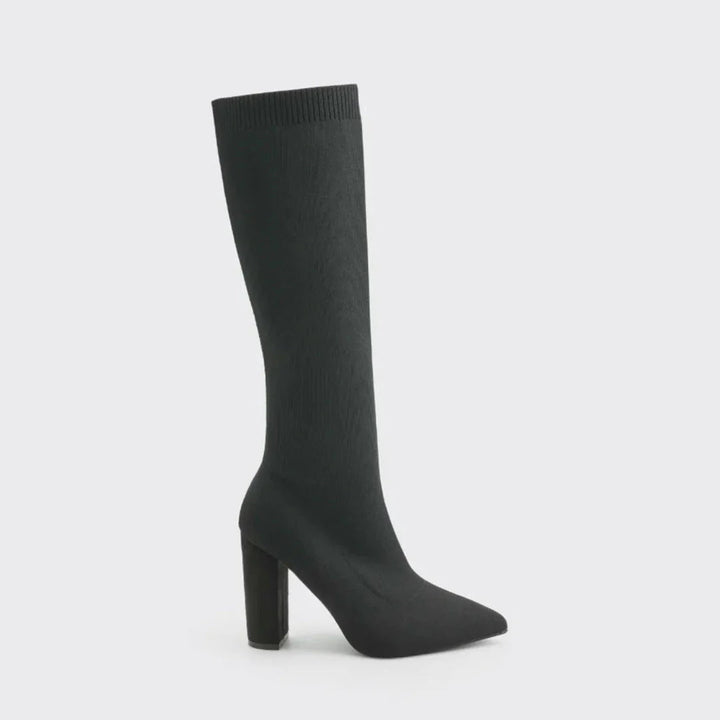 Slip-on women's stretch knee-high boots. Fashionable tall boots with a comfortable modern block heel.