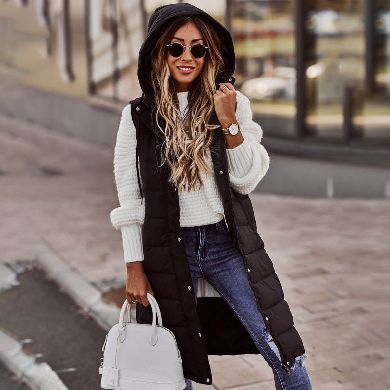 Women's knee-length quilted bodywarmer, perfect for stylish warmth and a chic layered look.