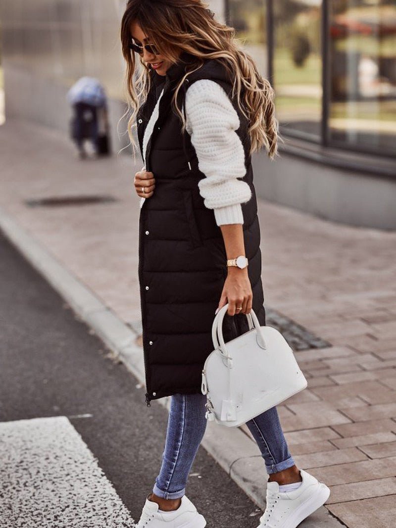 Aurora women's knee-length quilted vest, a fashionable sleeveless jacket for winter outerwear.