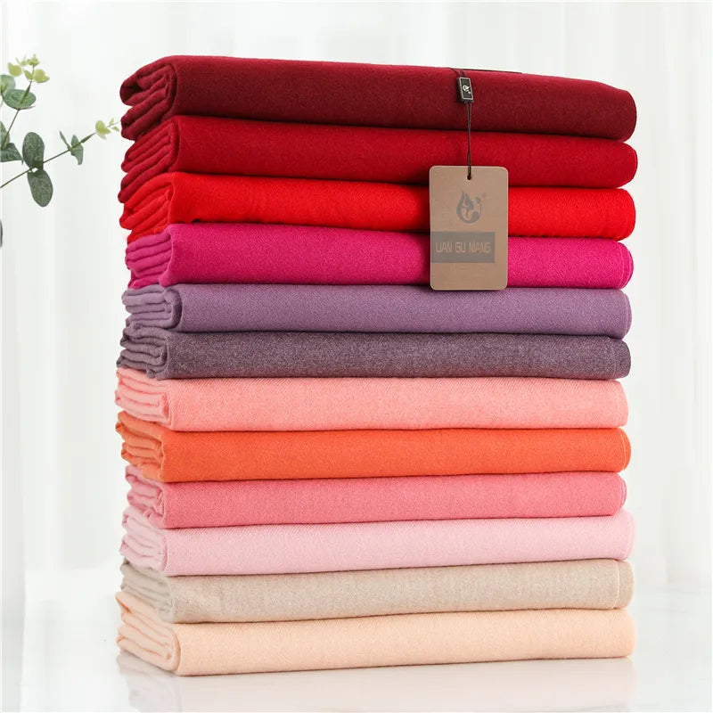 Krystal Cashmere women's scarf with delicate tassels, a warm & elegant fall winter accessory.