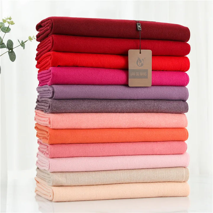 Krystal Cashmere women's scarf with delicate tassels, a warm & elegant fall winter accessory.