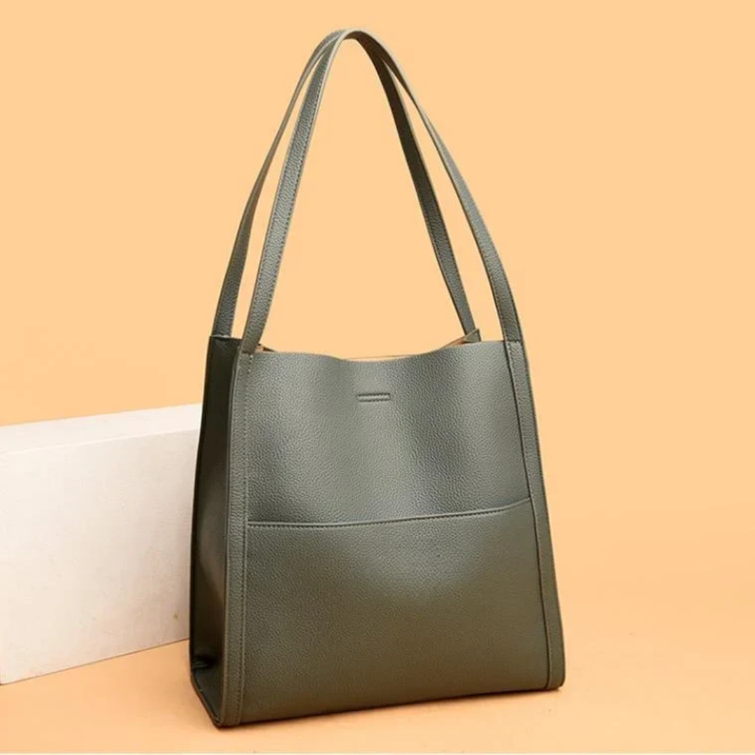 Stylish black leather tote handbag for women, large capacity, perfect for daily use & office.
