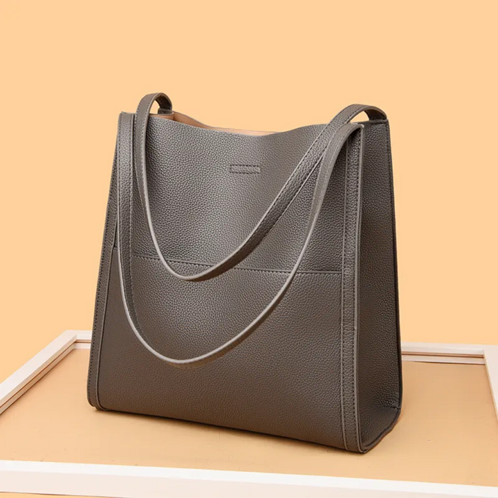 Grey women's large leather tote, a stylish and spacious everyday bag for all your needs.