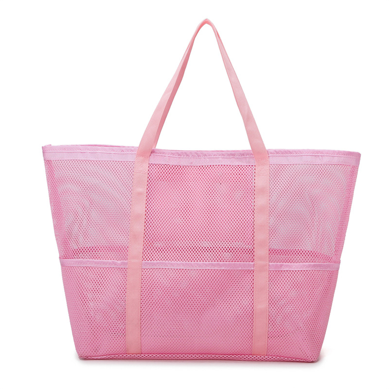 Stylish women's large mesh tote bag, ideal for beach trips, vacations, and summer outings. Lightweight design.