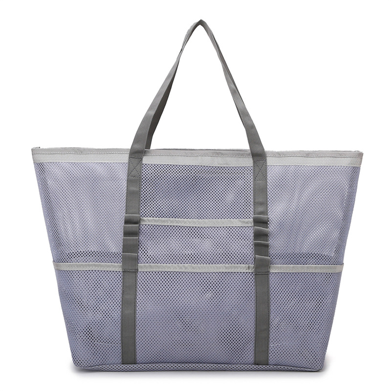 Durable women's large mesh beach tote bag, perfect for summer, vacation, and carrying all your essentials easily.