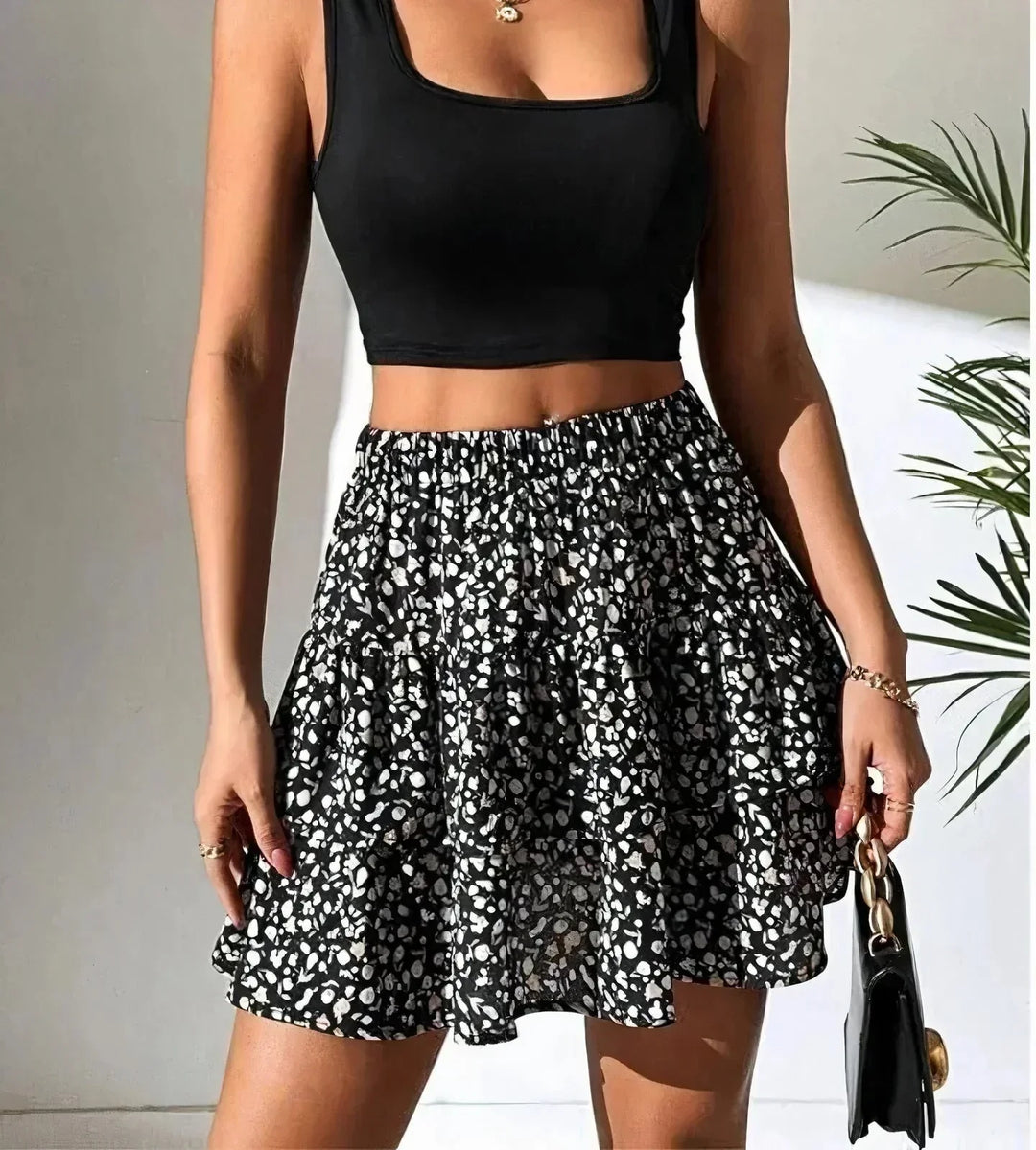 Pink layered A-line mini skirt for women. Stylish summer bottom, ideal for vacation wear.