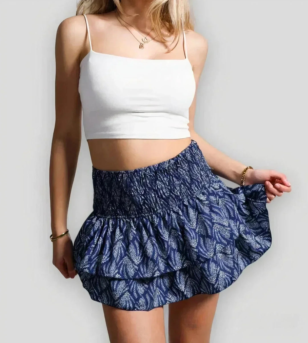 Black women's layered A-line mini skirt. Versatile, casual summer fashion for any outing.