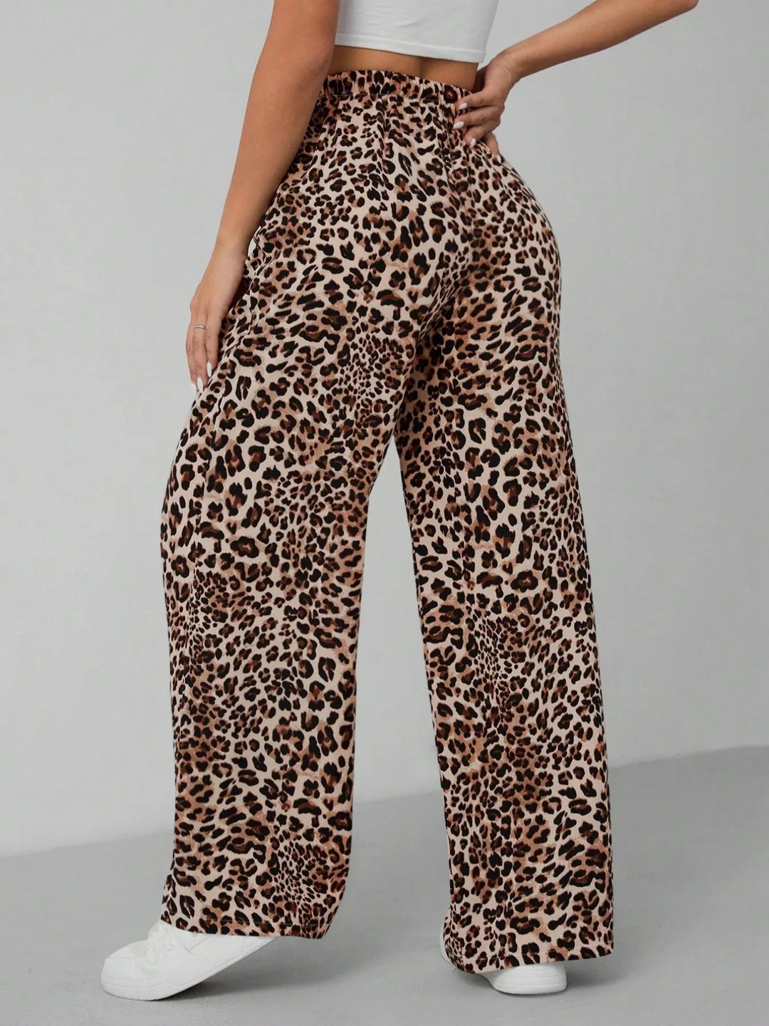 Chic women's leopard print wide leg pants, comfortable relaxed fit, perfect for trendy summer casual wear.