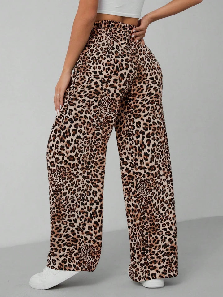 Chic women's leopard print wide leg pants, comfortable relaxed fit, perfect for trendy summer casual wear.