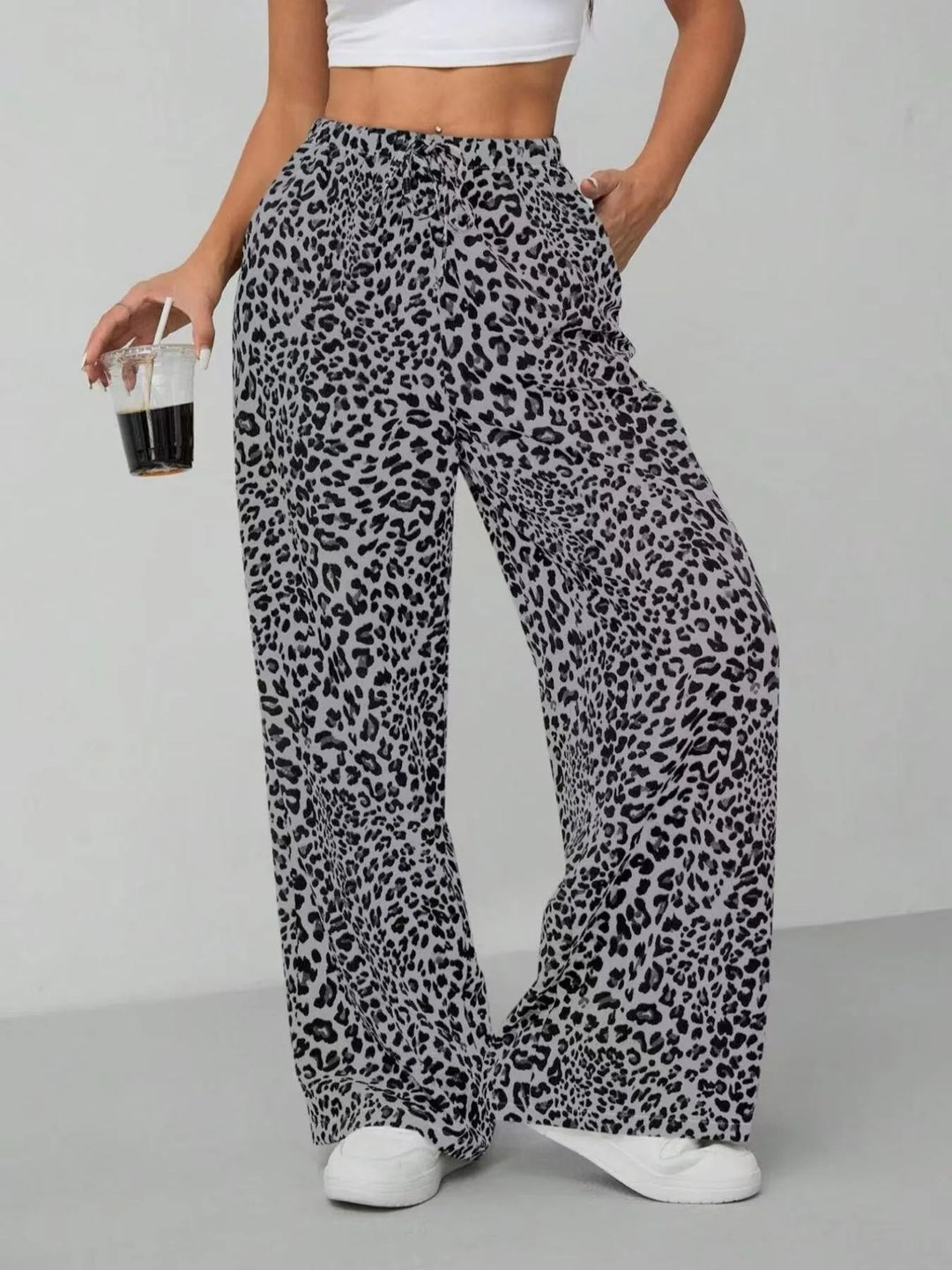 Casual women's leopard print wide leg pants, ideal for summer fashion, offering a relaxed and comfortable fit.