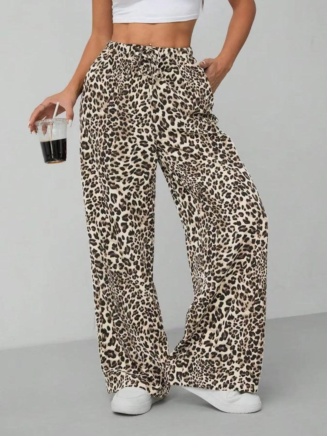 Women's trendy leopard print wide leg pants, casual summer fashion with a comfortable drawstring waist.