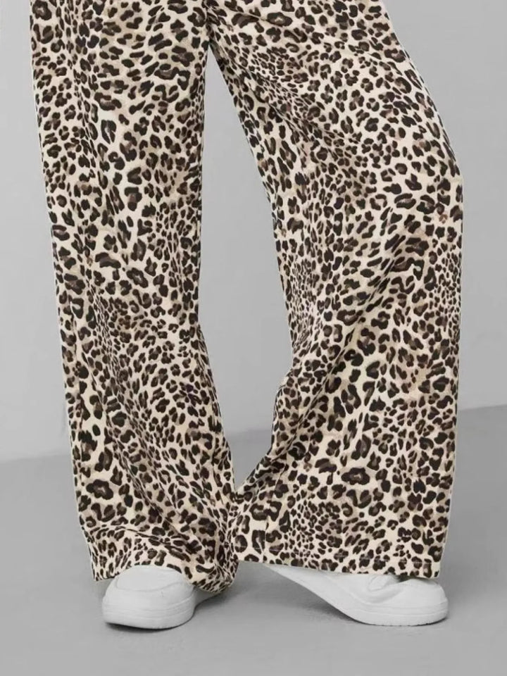 Chic women's apparel: leopard print wide leg pants with relaxed fit, perfect for stylish summer fashion.