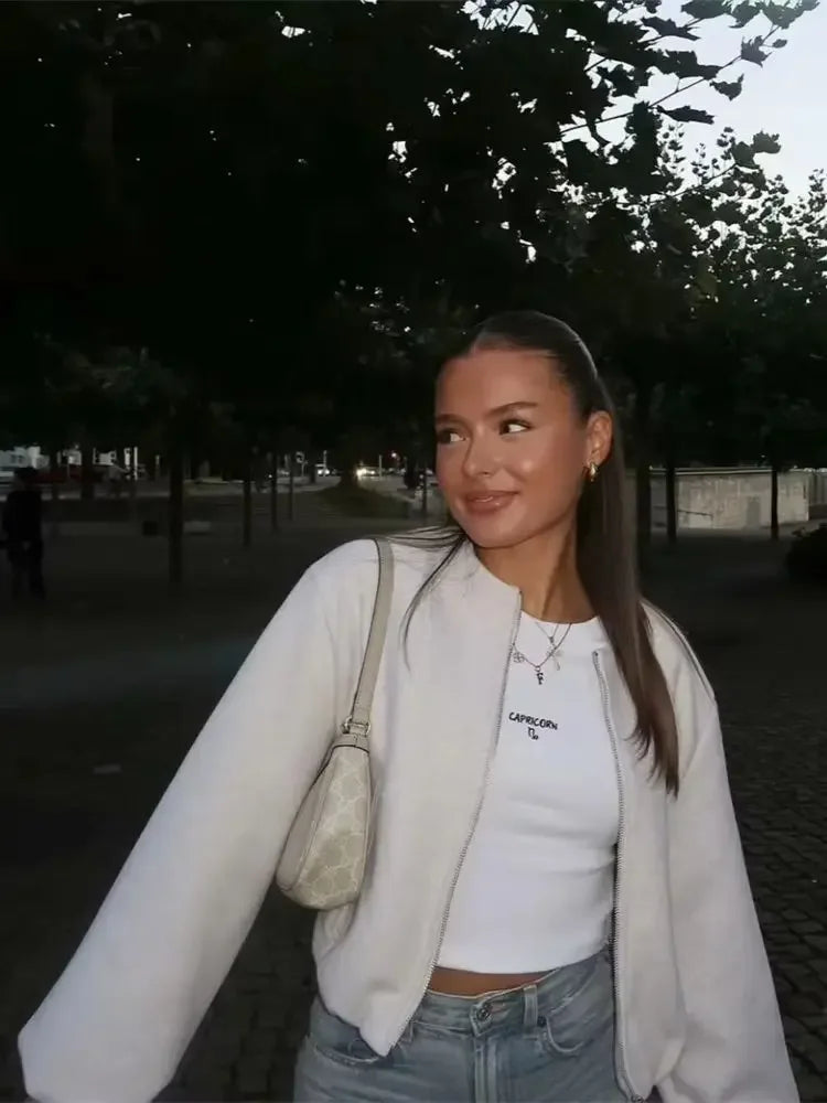 Woman wearing casual lightweight bomber jacket. Modern style, perfect versatile outerwear for everyday.