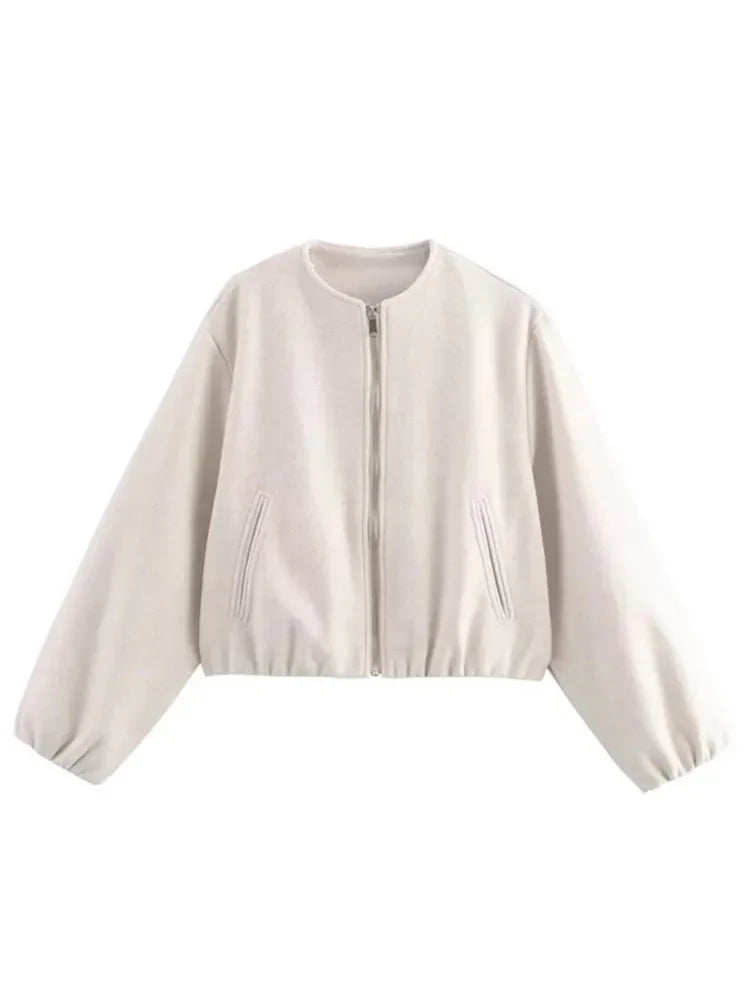 Sleek women's bomber jacket with ribbed cuffs & collar. Modern versatile lightweight outerwear design.