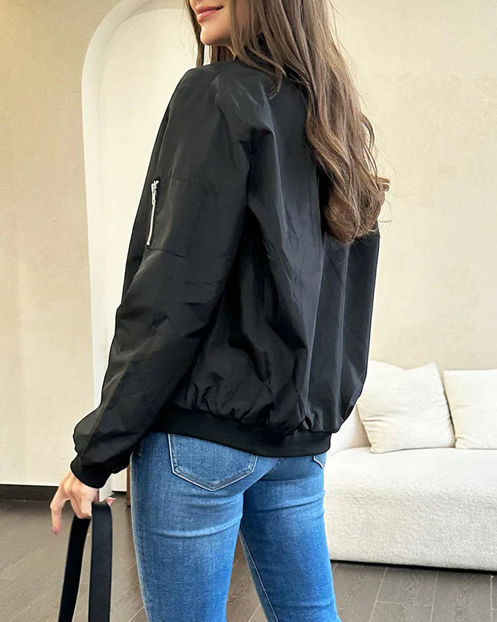 Lightweight bomber jacket for women, comfortable fit for stylish everyday wear.