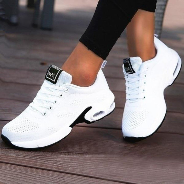 Women's lightweight everyday comfort sneakers. Versatile low-top casual shoes perfect for walking and daily wear.