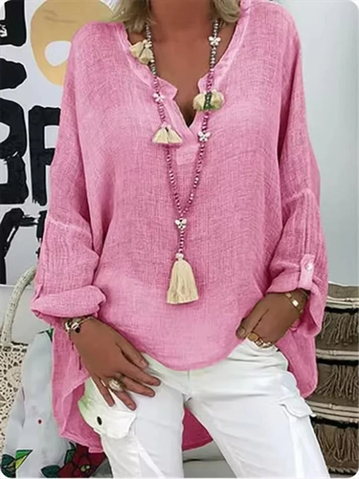 Effortlessly chic women's oversized top, versatile for casual or elegant wear, a perfect summer blouse.