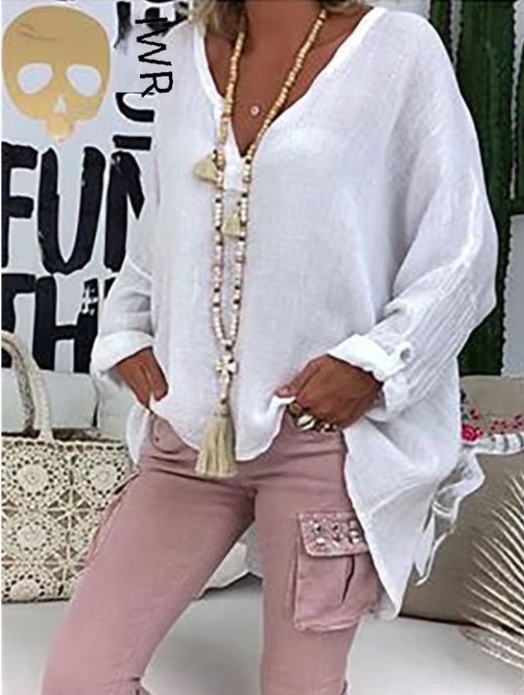Elegant women's oversized blouse with a lightweight, flowing fit, perfect for versatile casual chic styling.
