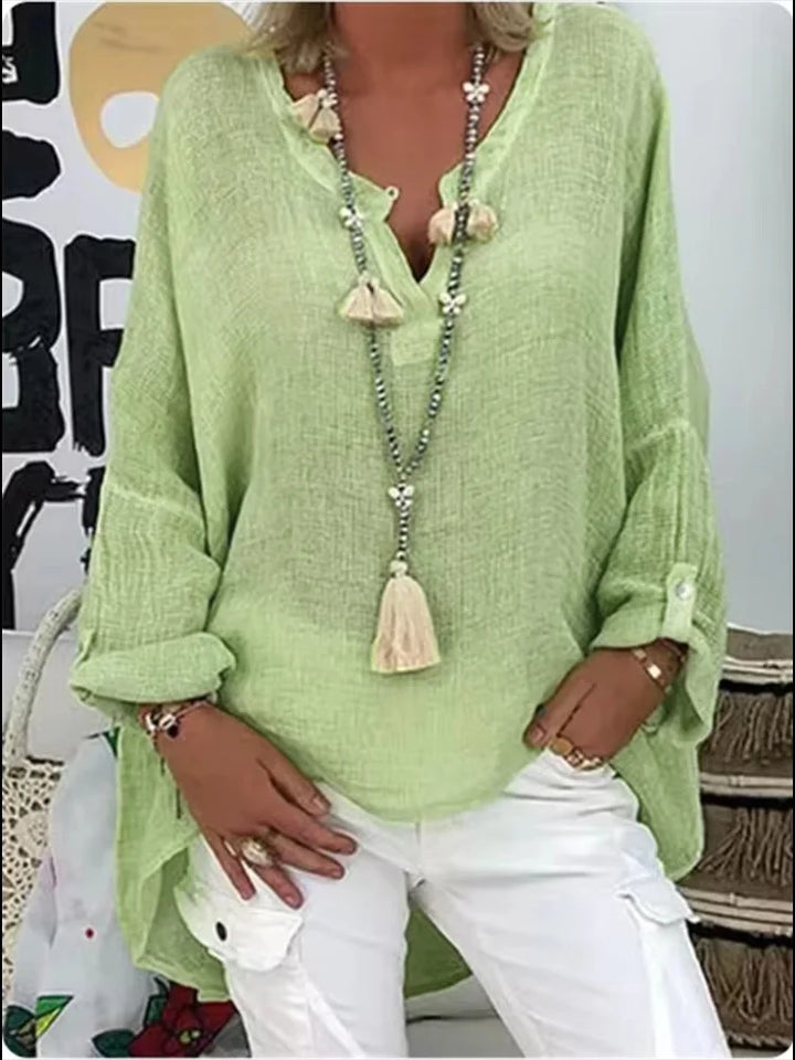Plus size friendly women's oversized blouse, lightweight and comfortable with a long sleeve and flowing fit.