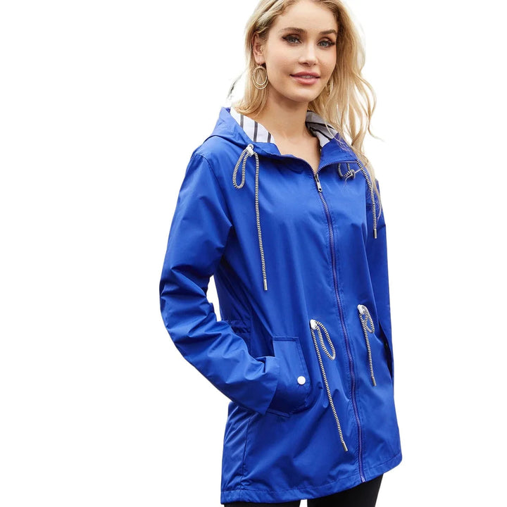 Women's lightweight waterproof trench coat, perfect for all seasons. Stylish and practical rain jacket.