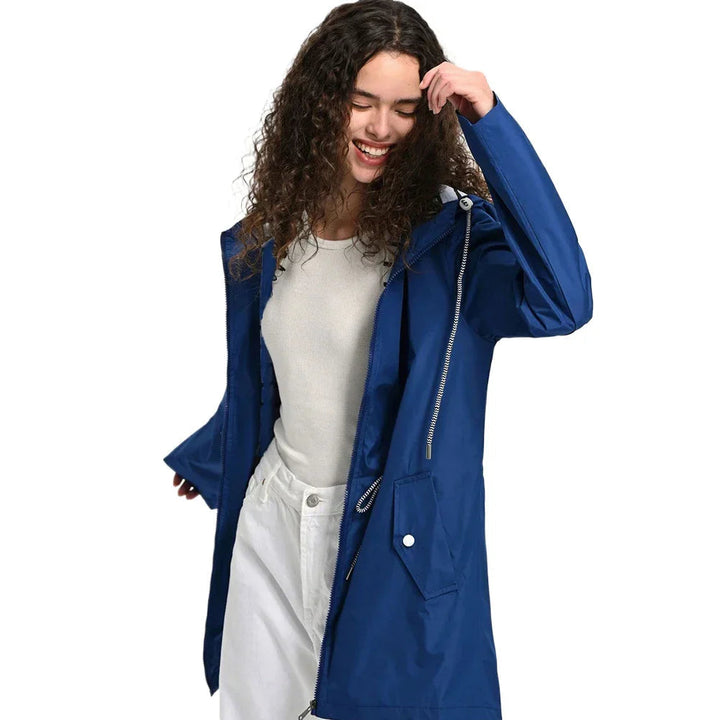 All-weather women's lightweight waterproof trench coat. Durable outdoor jacket, great for spring and fall rain.