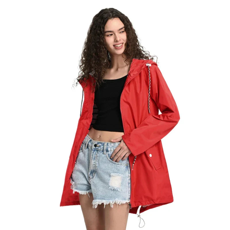 Women's fashionable lightweight waterproof trench coat. Essential travel jacket for all-season outdoor wear.