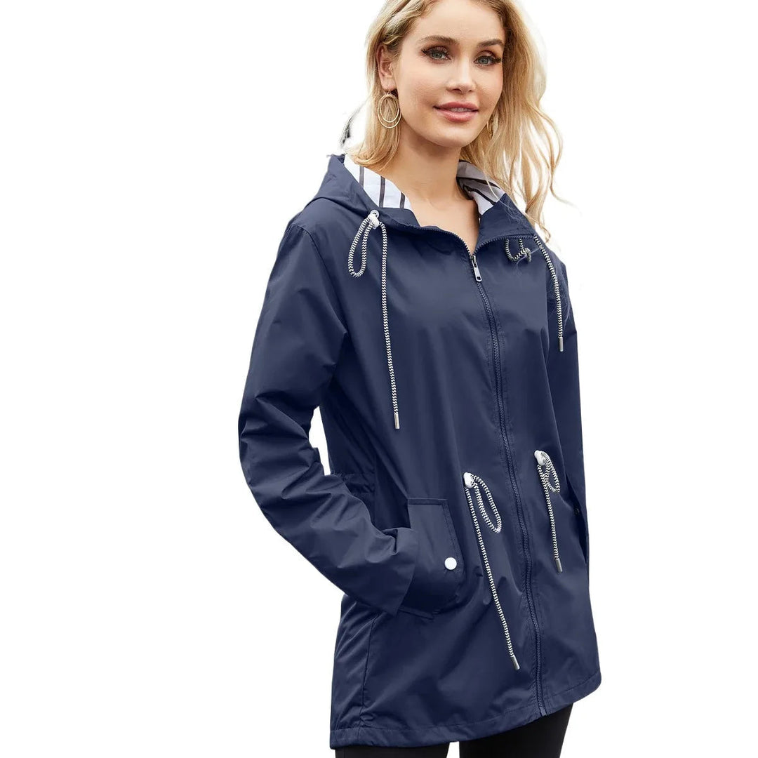 Classic women's lightweight waterproof trench raincoat. Everyday hooded jacket for all weather and seasons.