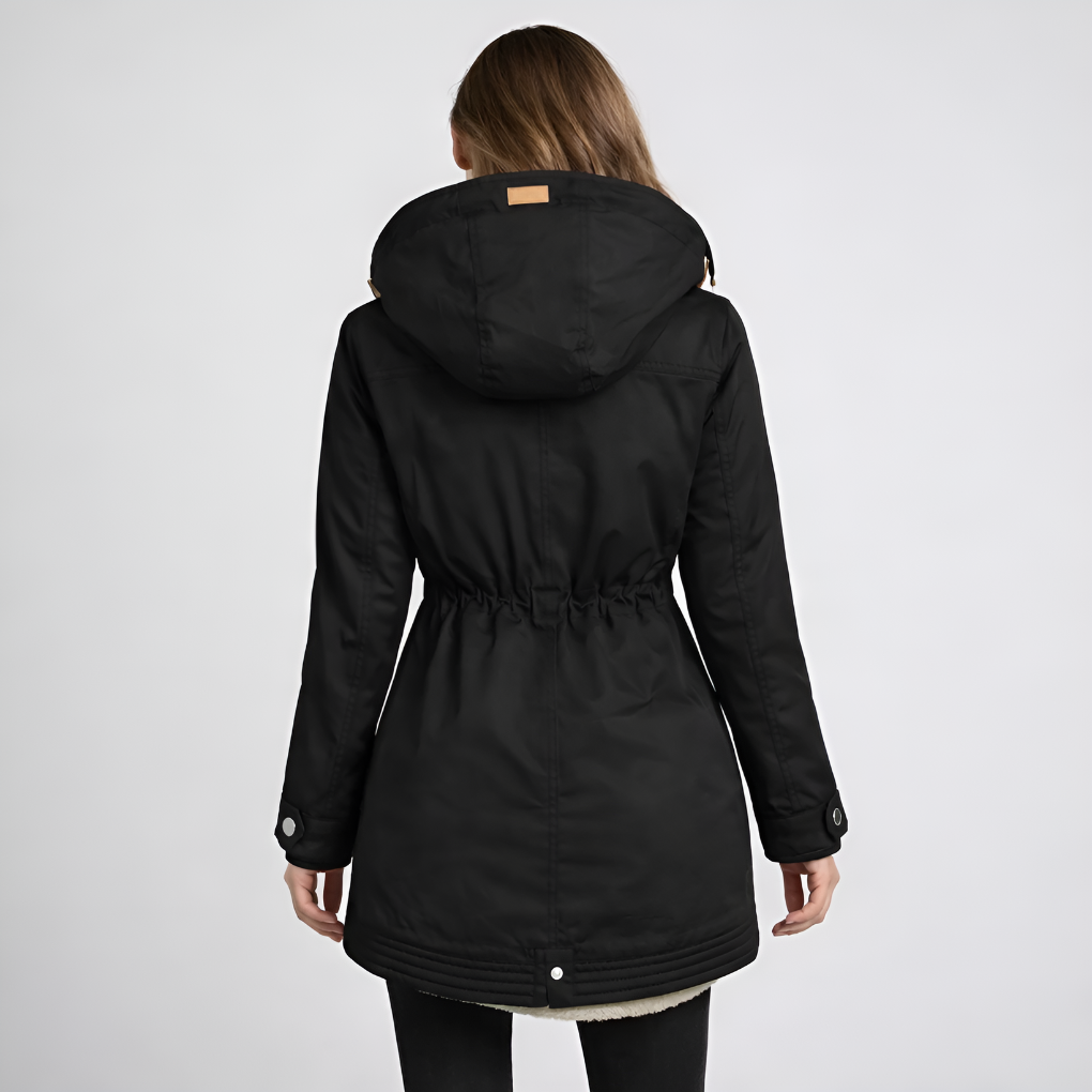 Stylish women's hooded utility parka. Mid-length, with an adjustable drawstring waist for a flattering fit & warmth.