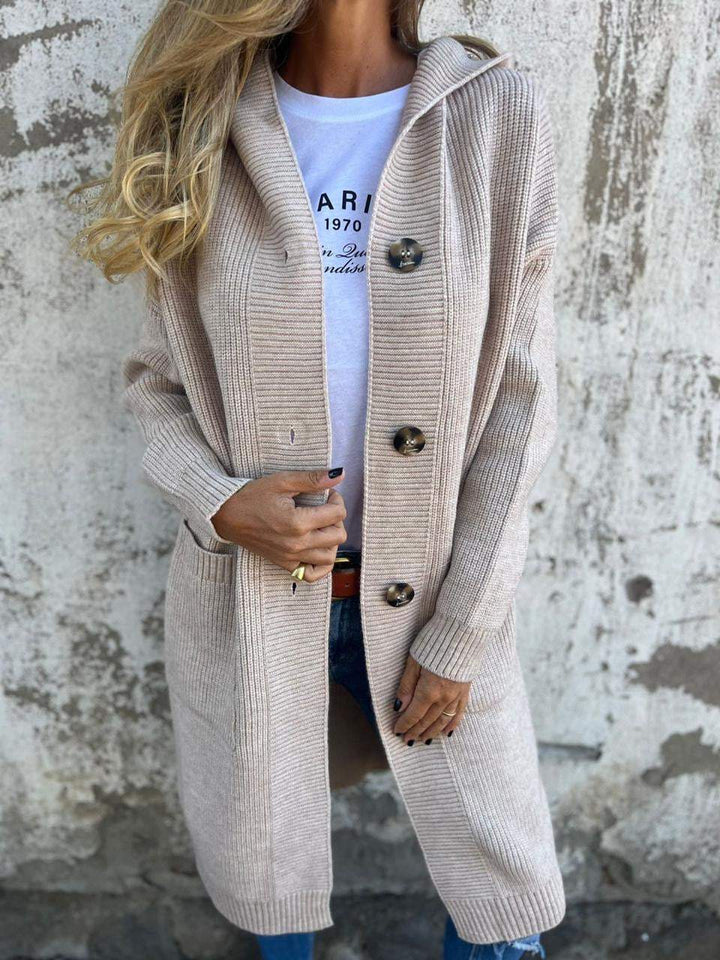 Women's long knit cardigan with front buttons, perfect for cozy layering in autumn and spring fashion.