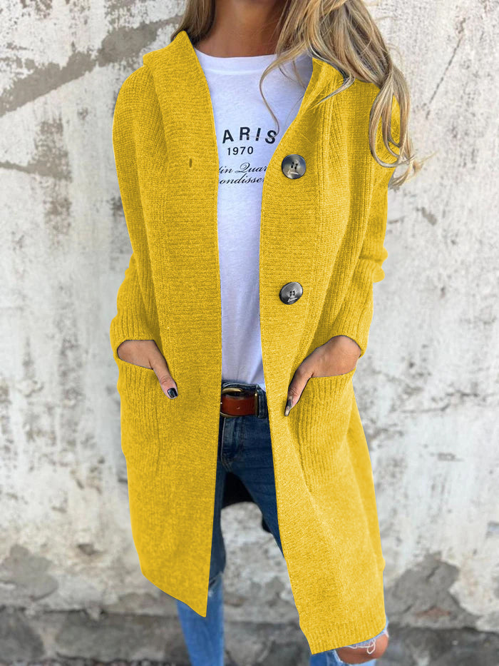 Versatile women's long knit cardigan with buttons, a comfortable and essential piece for casual autumn fashion.