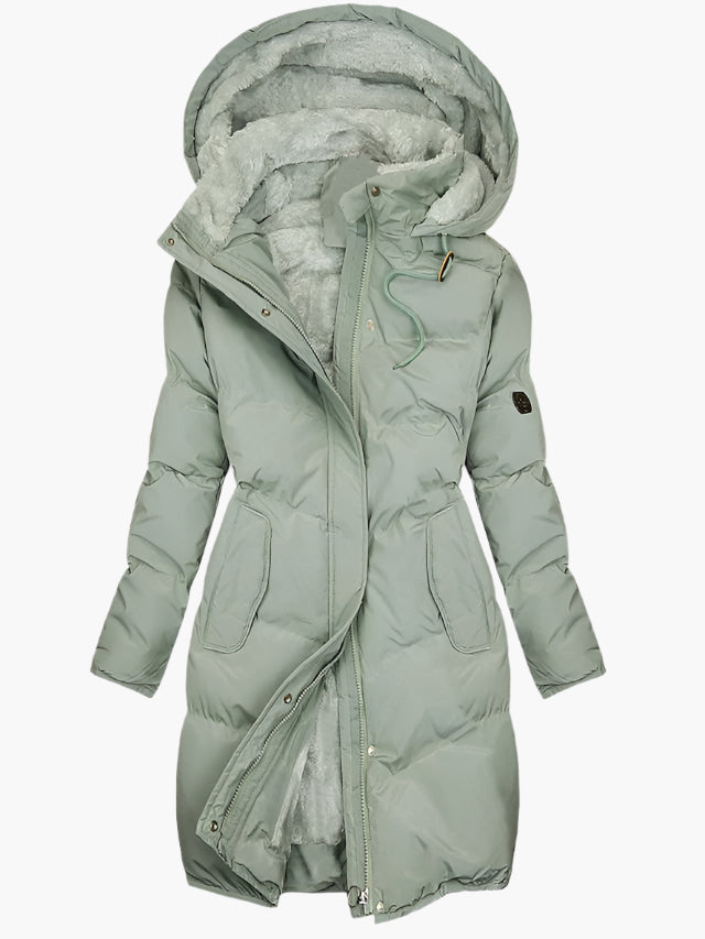Women's long quilted hooded winter coat, stylish and warm for cold weather, essential ladies outerwear.
