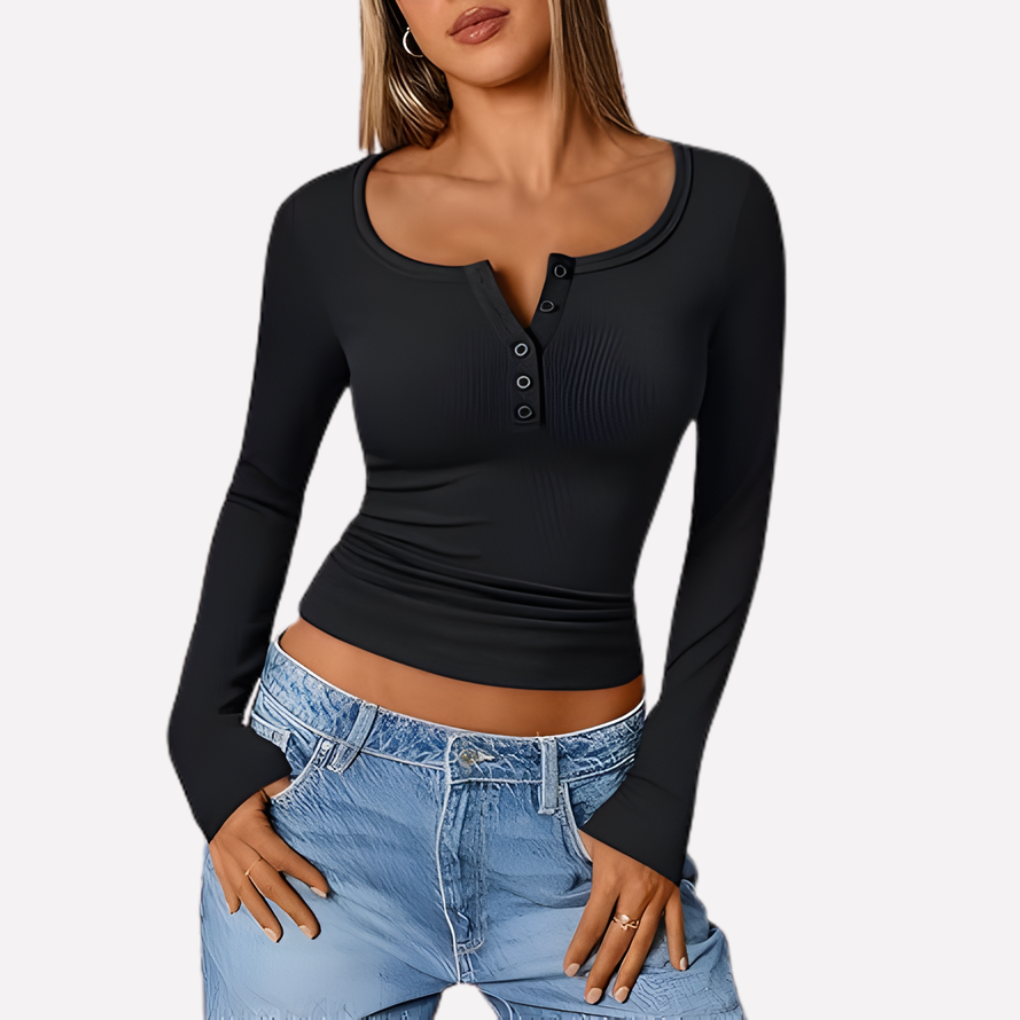 Stylish women's ribbed Henley top with long sleeves & button placket, offering comfort for versatile fashion.