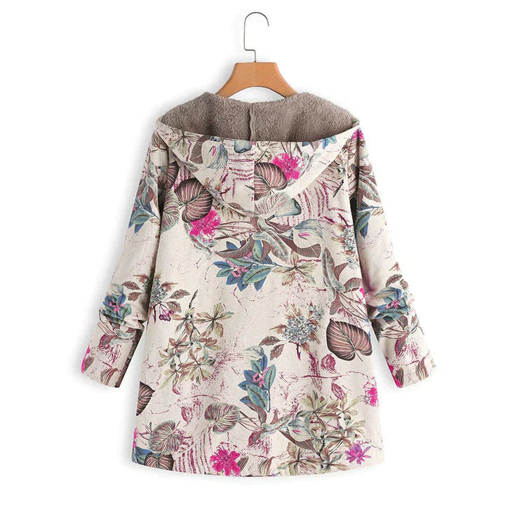 Women's long spring hooded jacket with front pockets. Lightweight, casual, & trendy transitional outerwear.