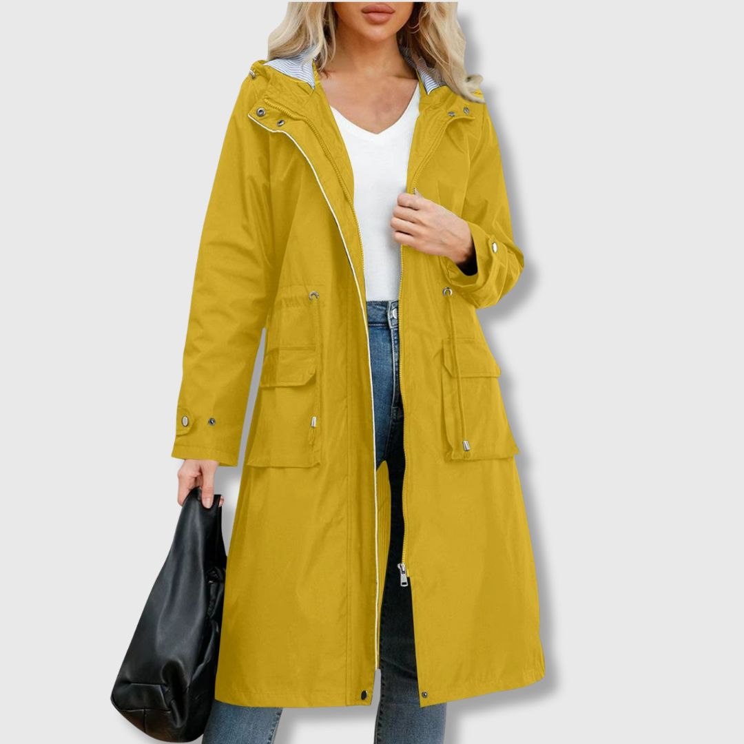 Women's long waterproof rain jacket with hood and adjustable drawstring waist. Perfect for spring & fall.