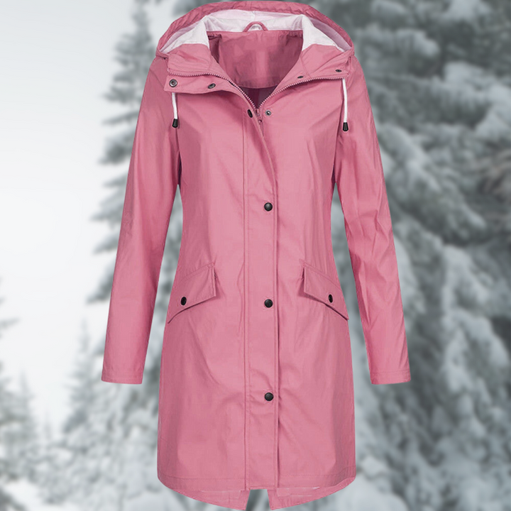 Camille long waterproof women's raincoat. Features an adjustable hood, perfect stylish rain gear for everyday use.