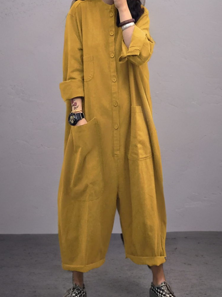 Women's loose fit summer jumpsuit with wide leg & V-neck. Comfortable, breathable, and stylish for casual or vacation wear.