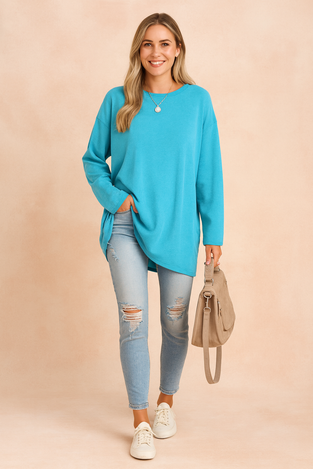 Stylish women's oversized sweater, offering ultimate comfort for a chic, relaxed look.