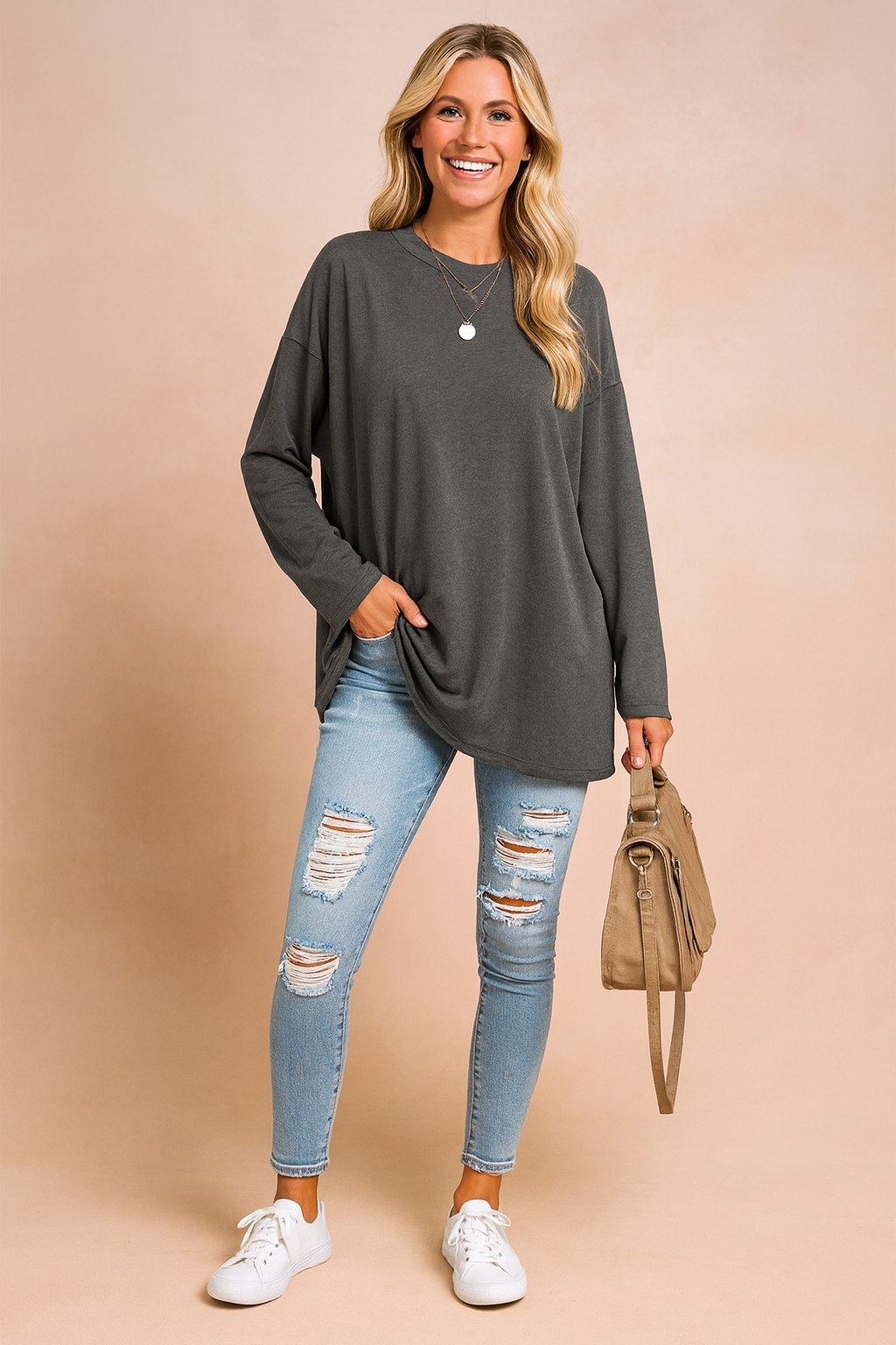 Women's oversized sweater, a versatile loose fit top essential for fall fashion.