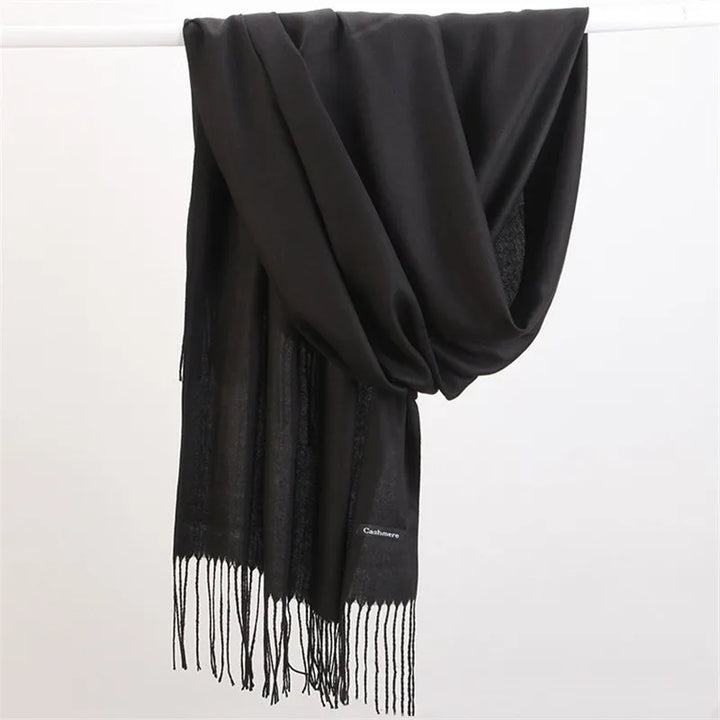 Women's luxurious Faith cashmere scarf, super soft and warm for winter style.