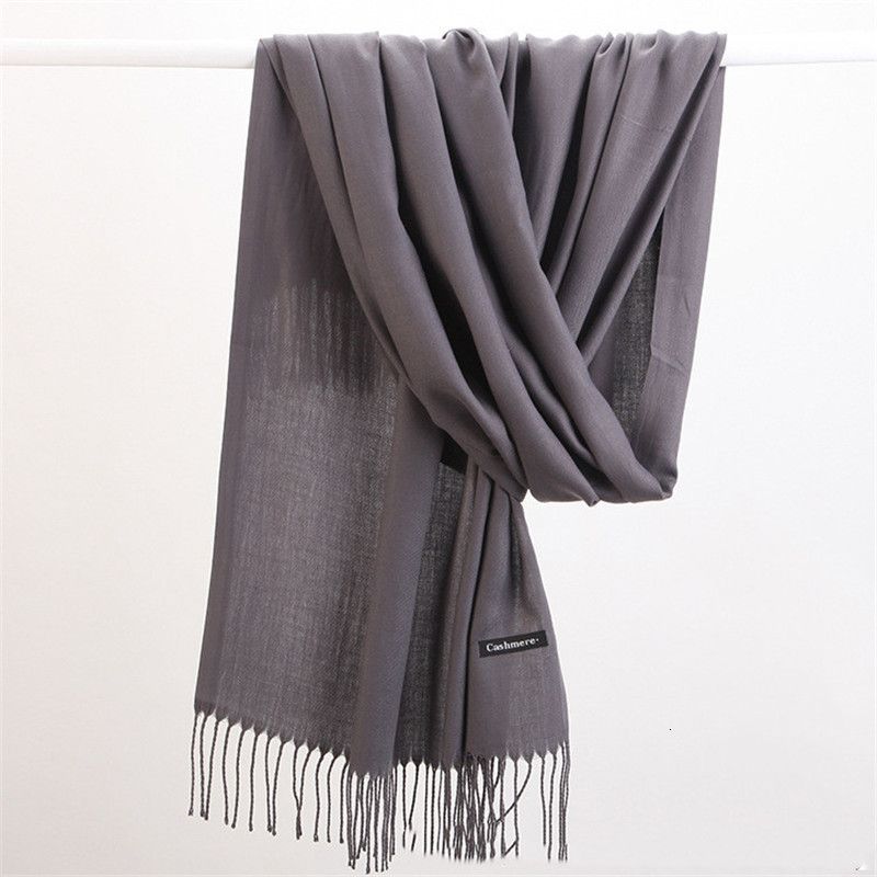 Stylish women's cashmere scarf, ideal for cold weather fashion and comfort.