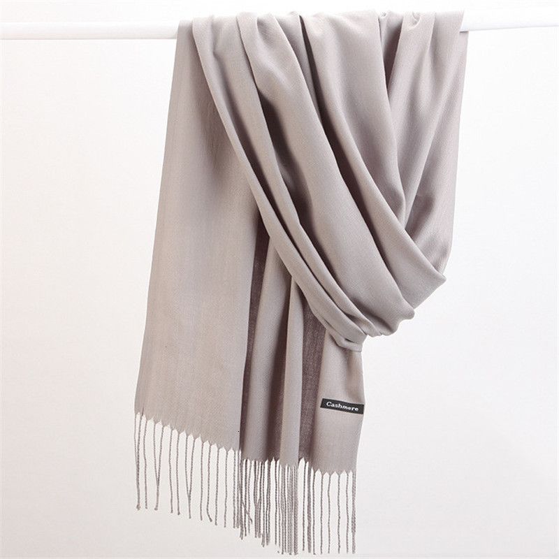 Elegant women's Faith Cashmere Scarf, offering luxurious warmth and versatile style.