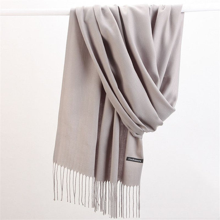 Elegant women's Faith Cashmere Scarf, offering luxurious warmth and versatile style.