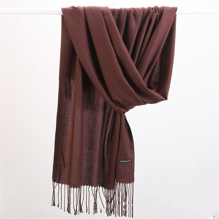 Stylish women's accessory: soft Faith cashmere scarf for versatile winter fashion.