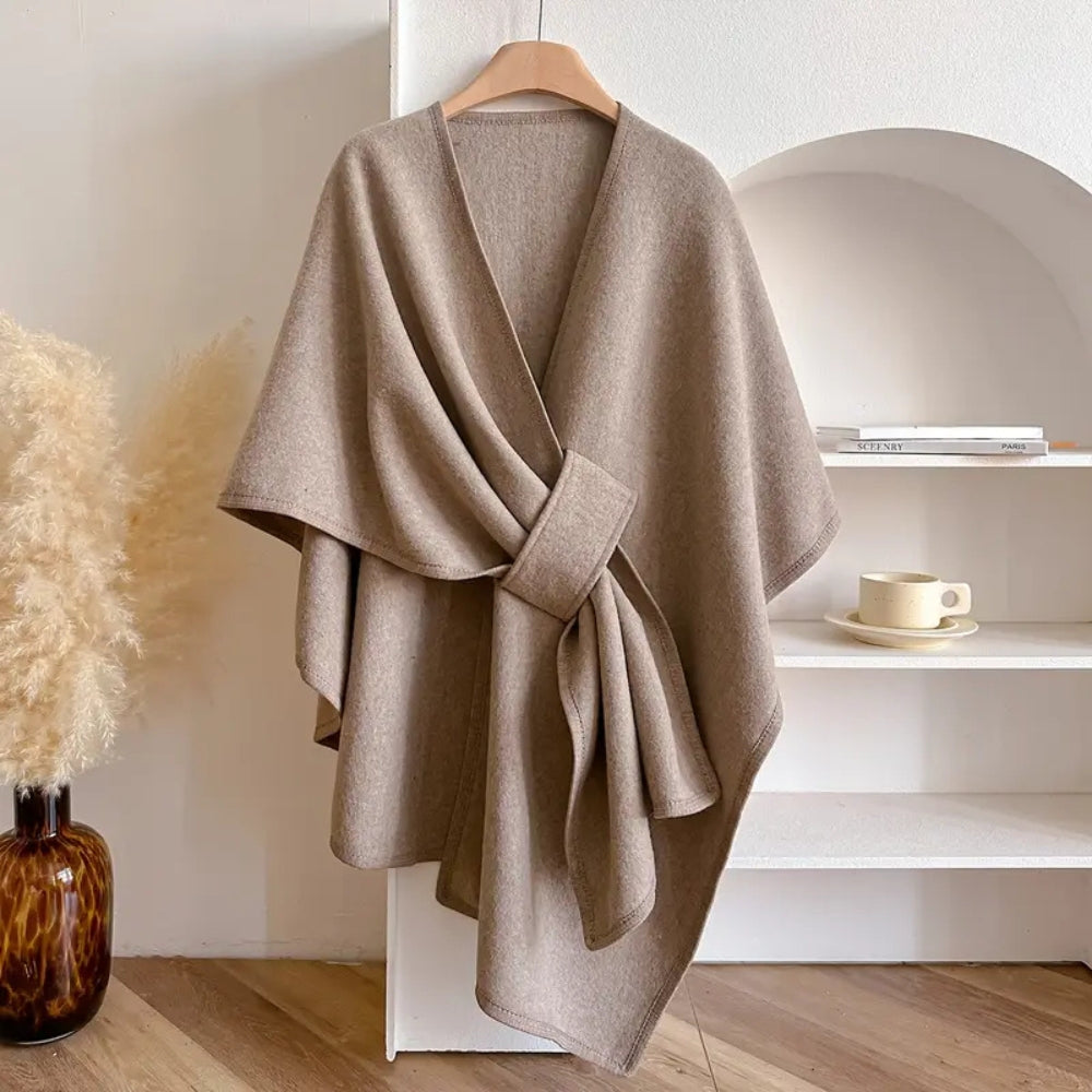Women's luxurious windproof poncho scarf coat, an elegant and versatile autumn/winter fashion accessory.