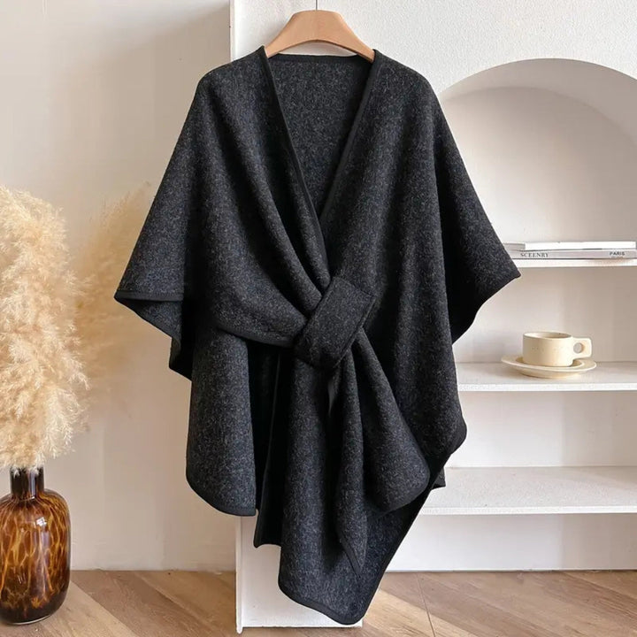 Practical windproof women's poncho scarf coat, offering elegant and cozy warmth for autumn/winter fashion.